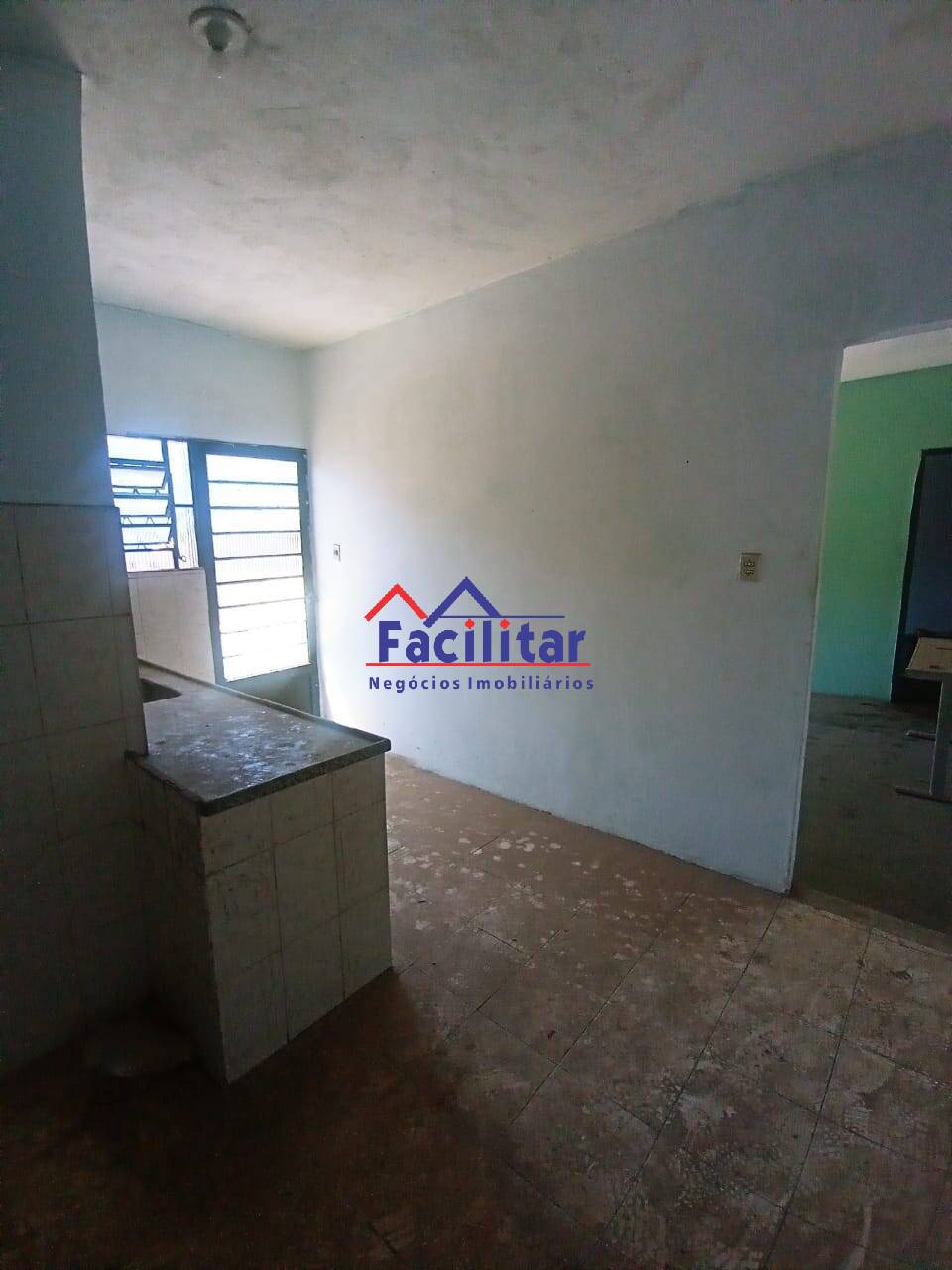 Casa com lote e GALPÃO