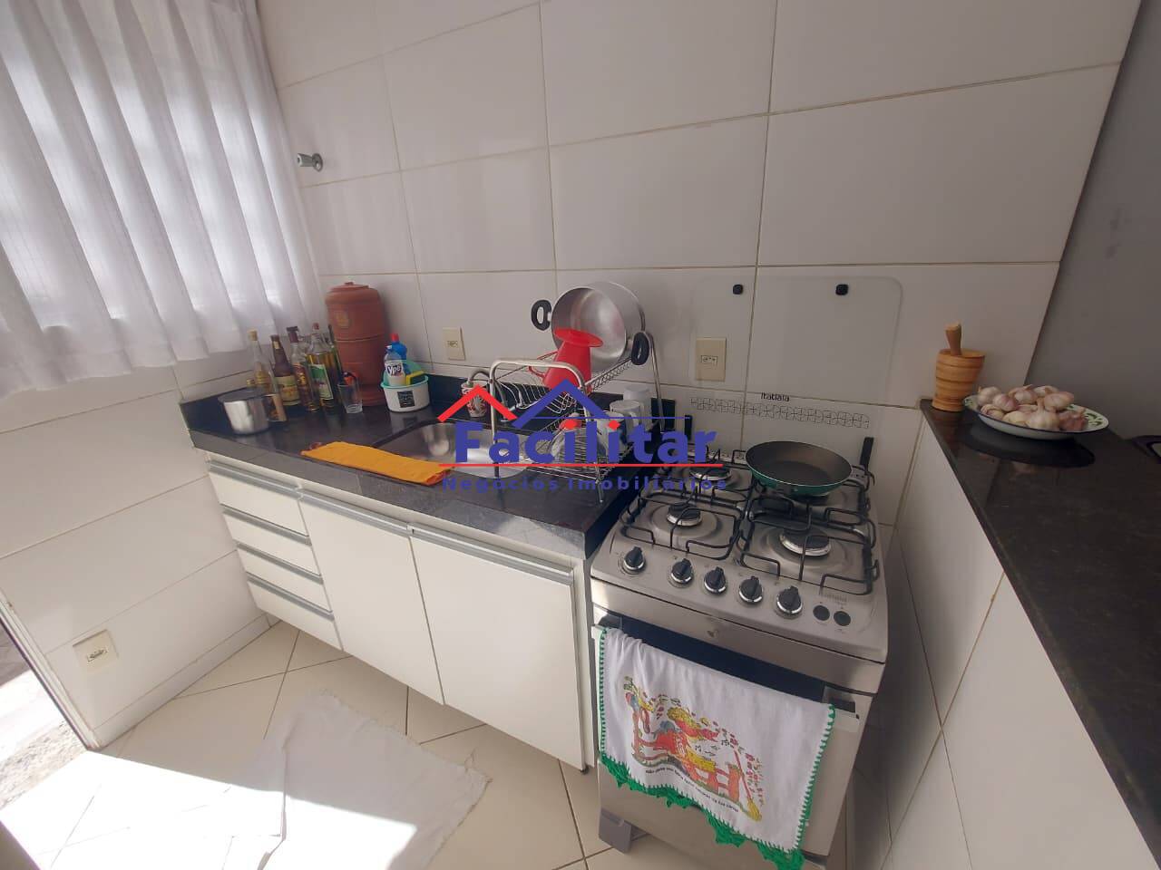 Casa em condomínio.